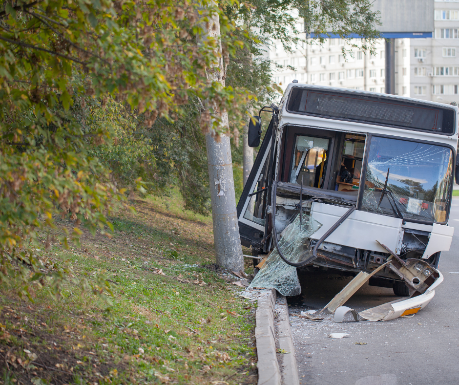 A New York bus accident attorney reviewing case files with a client.