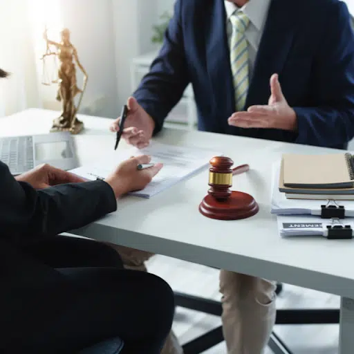 Attorneys at one of the top law firms in NYC discussing a personal injury case.