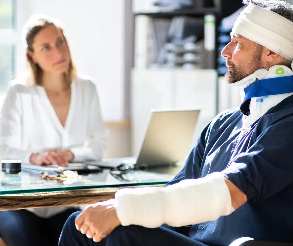 Construction accident attorney in NYC meeting with injured worker after scaffolding fall