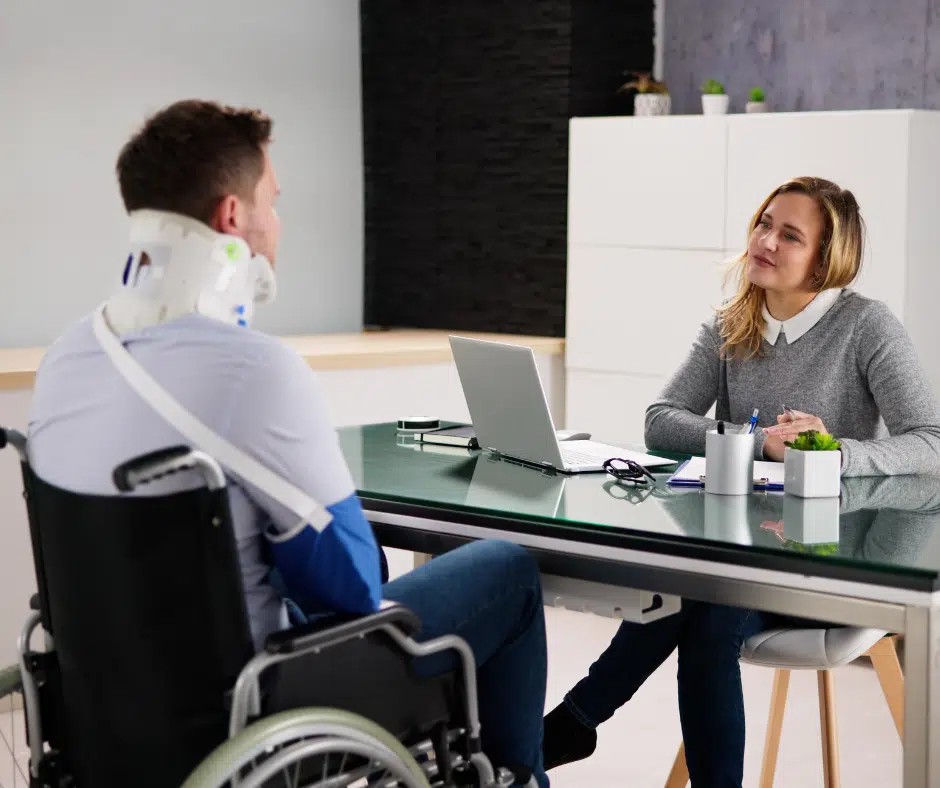 Client meeting with attorney about injury claim